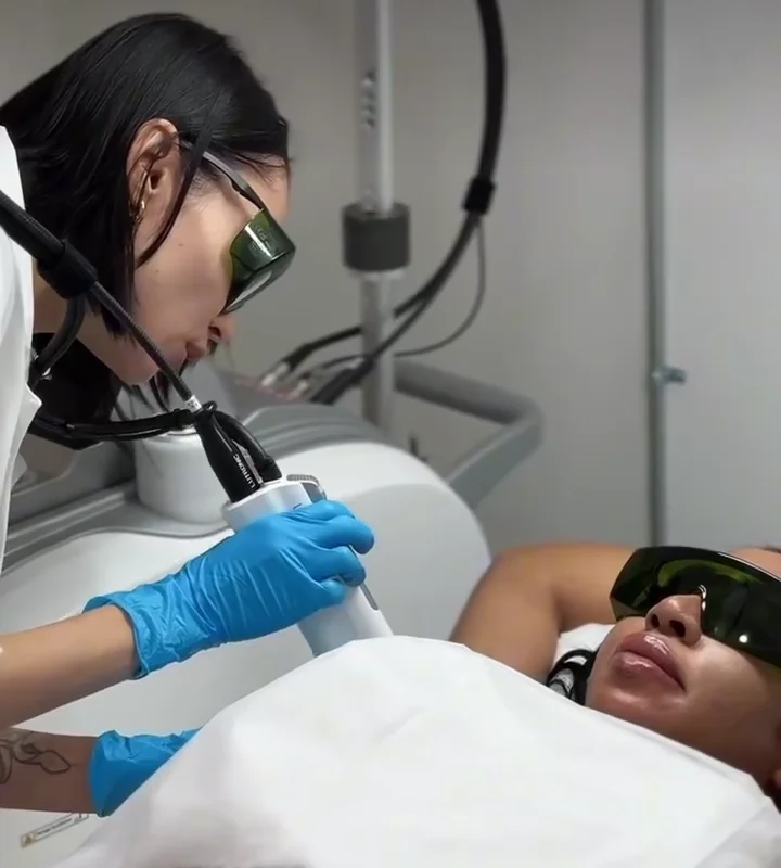 A woman receiving underarm laser hair removal at M. STUDIO