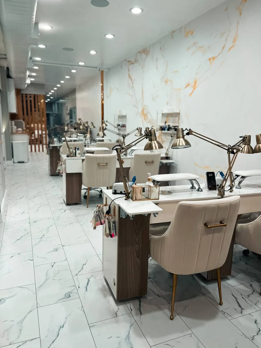 Manicure tables and seating inside M.STUDIO