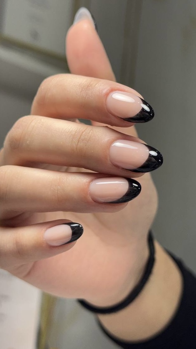 Black French gel manicure almond shape in NYC at M.STUDIO